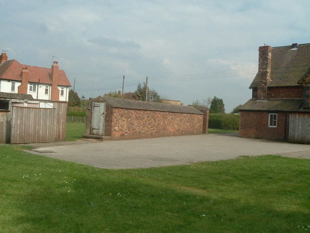 Toilet Block, Air Raid Shelter and Rear View of Village Hall